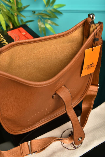 '- Evelyne Crossbody